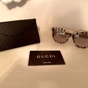 Gucci sunglasses .